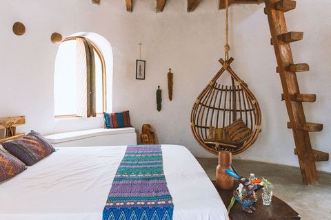 We got the white balance turned way up for these photos. Natural lighting is much more dark, but by design. Its so sunny and hot here, you want shade