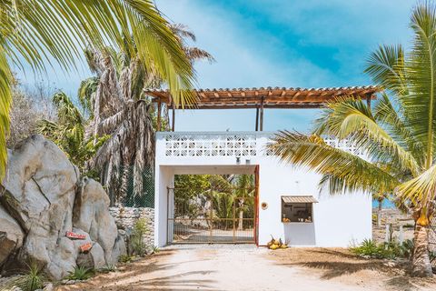 Gated entrance with key pad security. On top is one of the best spots to see the sunset while enjoying a beverage.