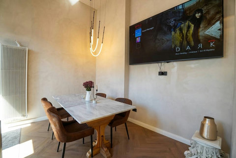 Cinema-style smart TV in the ambient dining and living area