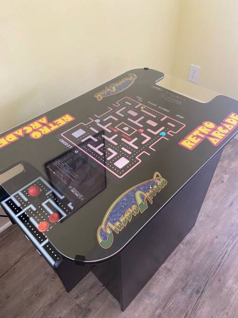 Retro arcade with Pac-Man, Galaga, and more.