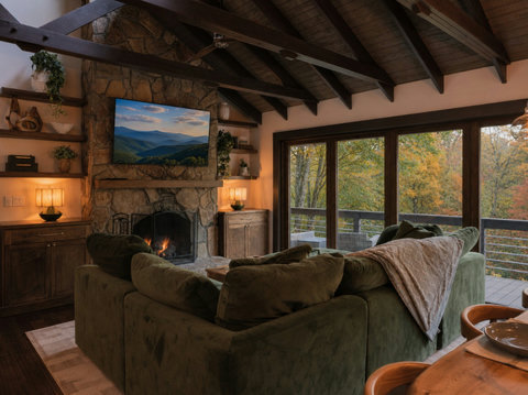 Living Room and Dining with deck access large windows and fireplace