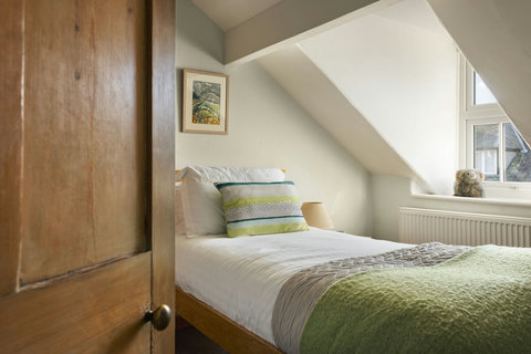 The green bedroom, a cosy single (also where the travel cot and mattress is available)