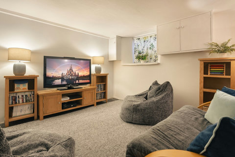 Games room in the basement with 50 inch TV, Wii and X-Box and plenty of games and puzzles to play
