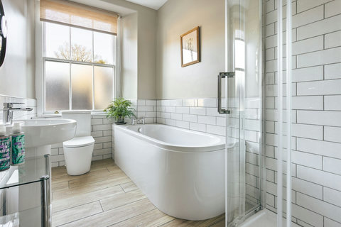 No need to wait!  The first of 2 bathrooms on the 1st floor with bath and shower

