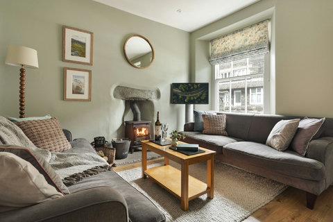 Cosy lounge moments from town centre with log burner to relax after a day on the fells!
