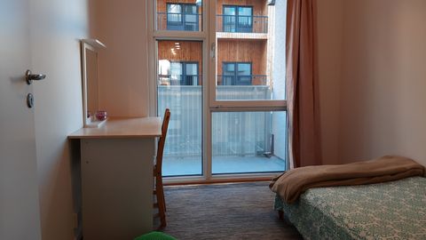 Table/Chair in Bedroom 2 (with Balcony View).