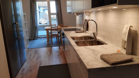 Kitchen, and Dining Room in the Background