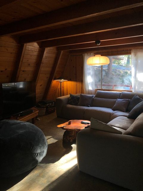 Living room with large television and an Amazon Prime fire stick (bring your own login please!)