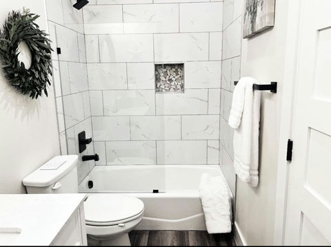 This modern guest bath is not only a place to freshen up, but a serene retreat where you can refresh.