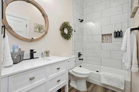 This modern guest bath is not only a place to freshen up, but a serene retreat where you can refresh.