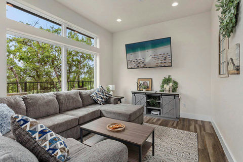 Relax in spacious living rooms with comfy seating and stylish décor—ideal for movie nights, family gatherings, or just unwinding after a day on the river. Your home away from home at The Riverscape at Gruene!