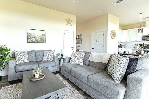 Relax in spacious living rooms with comfy seating and stylish décor—ideal for movie nights, family gatherings, or just unwinding after a day on the river. Your home away from home at The Riverscape at Gruene!