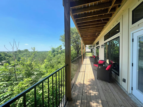 Take in serene views from comfortable outdoor seating overlooking the river,