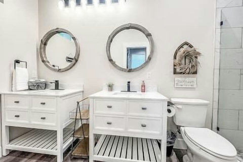 Enjoy the luxury of plush white towels, complimentary shampoo, and body wash.