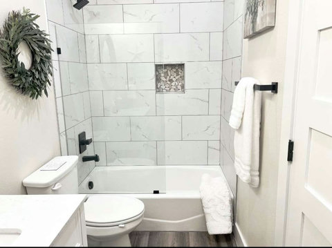 This modern guest bath is not only a place to freshen up, but a serene retreat where you can refresh.