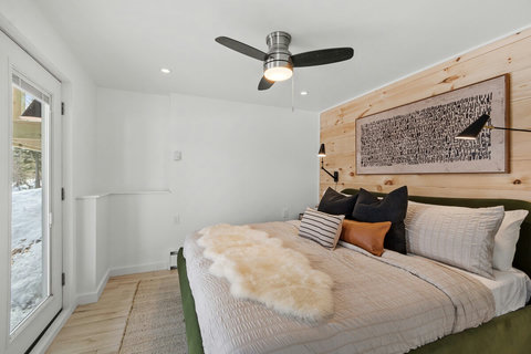 King bed. Walk out access. Lower bedroom. 