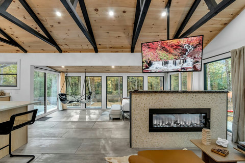 TV on Swivel and see though fireplace with awesome views. 
