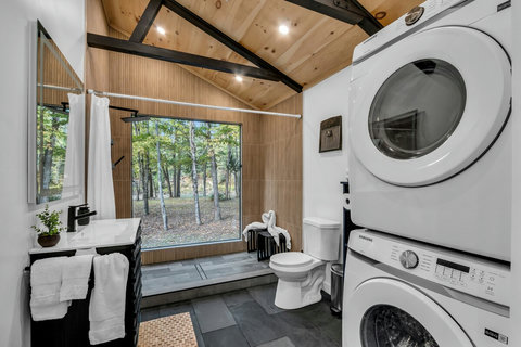 Laundry inside the large Bathroom. Heated Floors. 