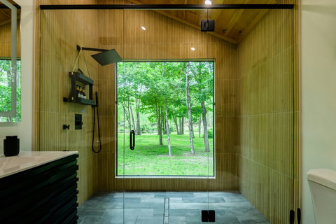 heated floor bathroom with massive view. laundry and lighted mirror 