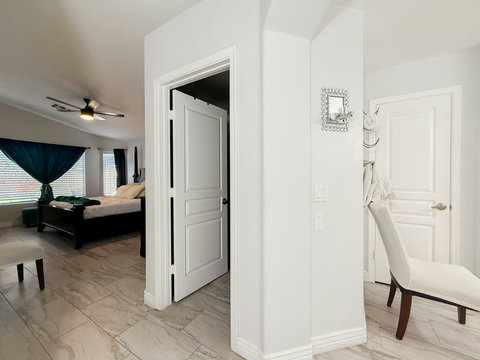 Bright, spacious bedroom suite with natural light and elegant finishes