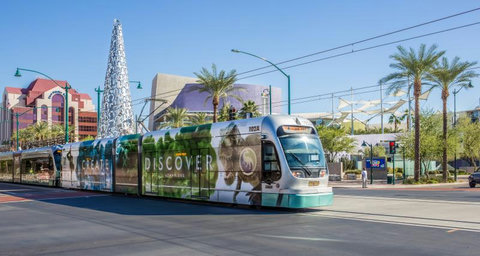 Convenient light rail access in a sunny, palm-lined neighborhood