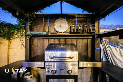 Covered backyard BBQ station for easy outdoor grilling and relaxing evenings
