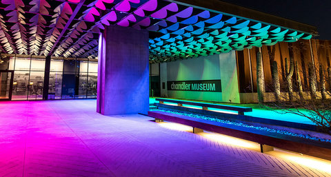 Vibrant nighttime view of the modern Chandler Museum entrance
