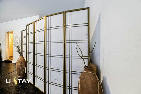 Elegant room divider with designer touches and boutique-style decor