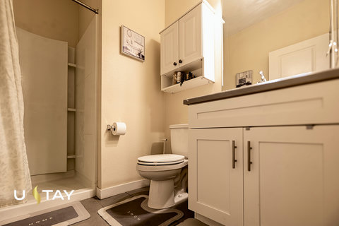 Bright bathroom with extra storage and a clean, modern look