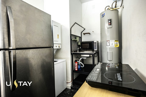 Convenient kitchenette and in-unit laundry for easy extended stays