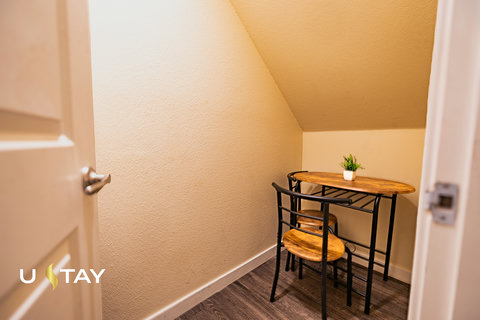 Cozy tucked-away dining nook perfect for coffee or a quiet workspace