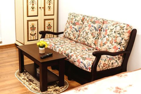Stylish extendable sofa with flower theme of course ;)