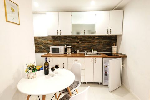 Would you rather have the wine from the table or the beer from the fridge?