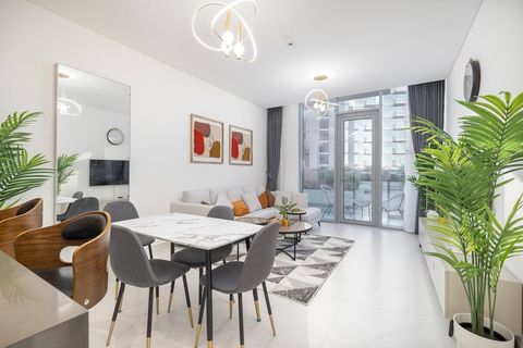 Living room with dining area, perfect for entertaining guests.