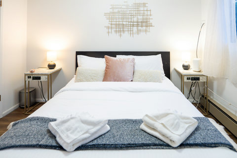 Clean, relaxing primary bedroom