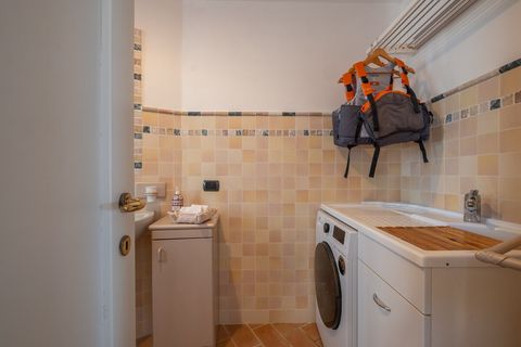 service bathroom with laundry