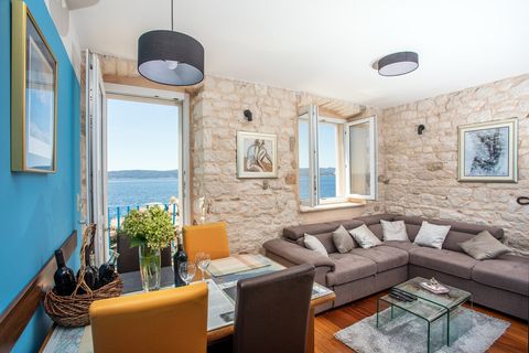 Cozy living room with a beautiful sea view, perfect for relaxing and soaking in the tranquil coastal atmosphere.