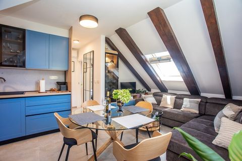 Open-concept living and dining area with a lovely sea view, perfect for cooking, relaxing, and sharing moments together.