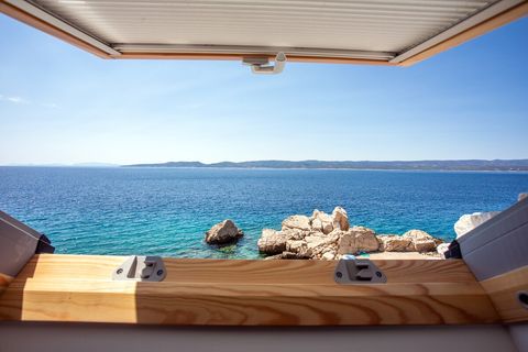 Beautiful sea view from the upper room, where the horizon stretches endlessly across the blue.