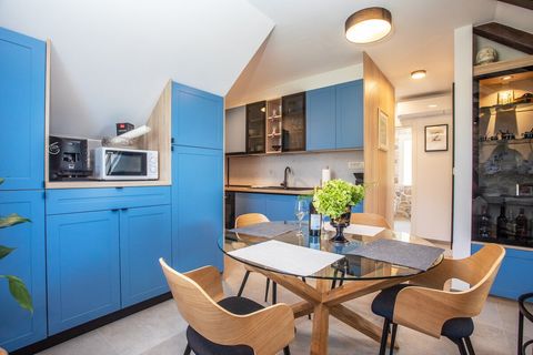 Contemporary kitchen with clean design and plenty of light, perfect for creating meals in comfort and style.