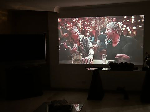 110 inch proyector to see music videos and movies with Roku to see your streaming apps or YouTube.