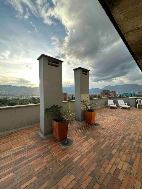 Rooftop with chairs.