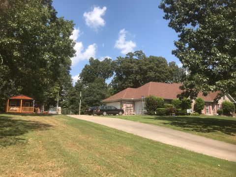 Home on the right with guest house.