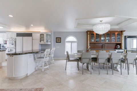 View of Open Concept Kitchen/Dining Areas Seamlessly entertain guests in this spacious layout that blends function with style.