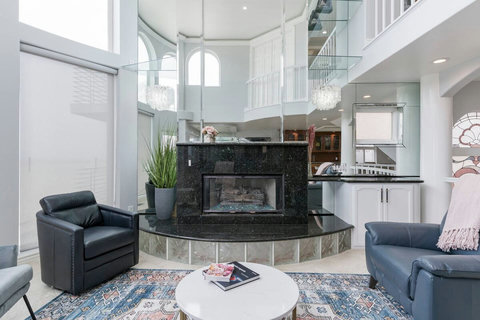 A Gas Fireplace Create a cozy ambiance with the flick of a switch – perfect for cooler evenings.