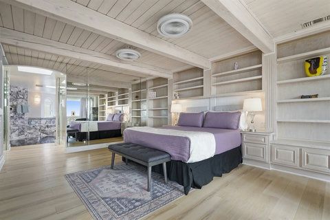 Sleep Like Royalty in Our King Bedroom Relax in the spacious king bedroom, designed for ultimate comfort and luxury.