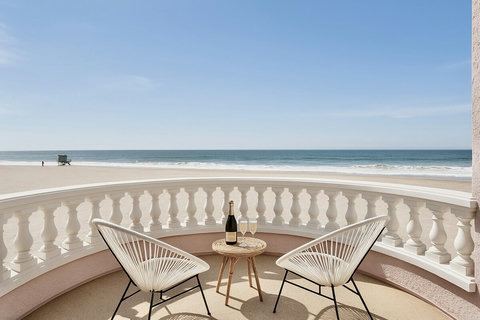 Cheers the perfect day on your third floor balcony