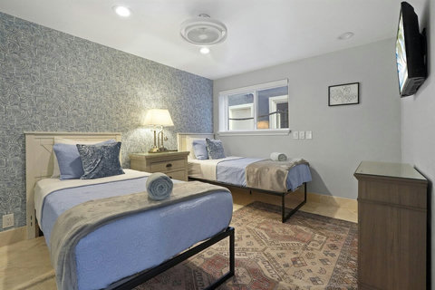 Two Twins Ground Floor Bedroom The perfect hideaway for kids or guests, this twin bedroom is bright and welcoming, with plenty of space to relax