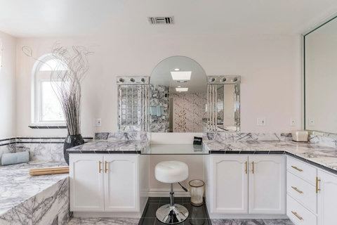 Her Side Has Vanity Feel pampered with a dedicated space for your morning and evening routines.