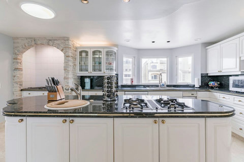 Plan a family feast or romantic dinner with everything you need, from a spacious countertop to sleek appliances.